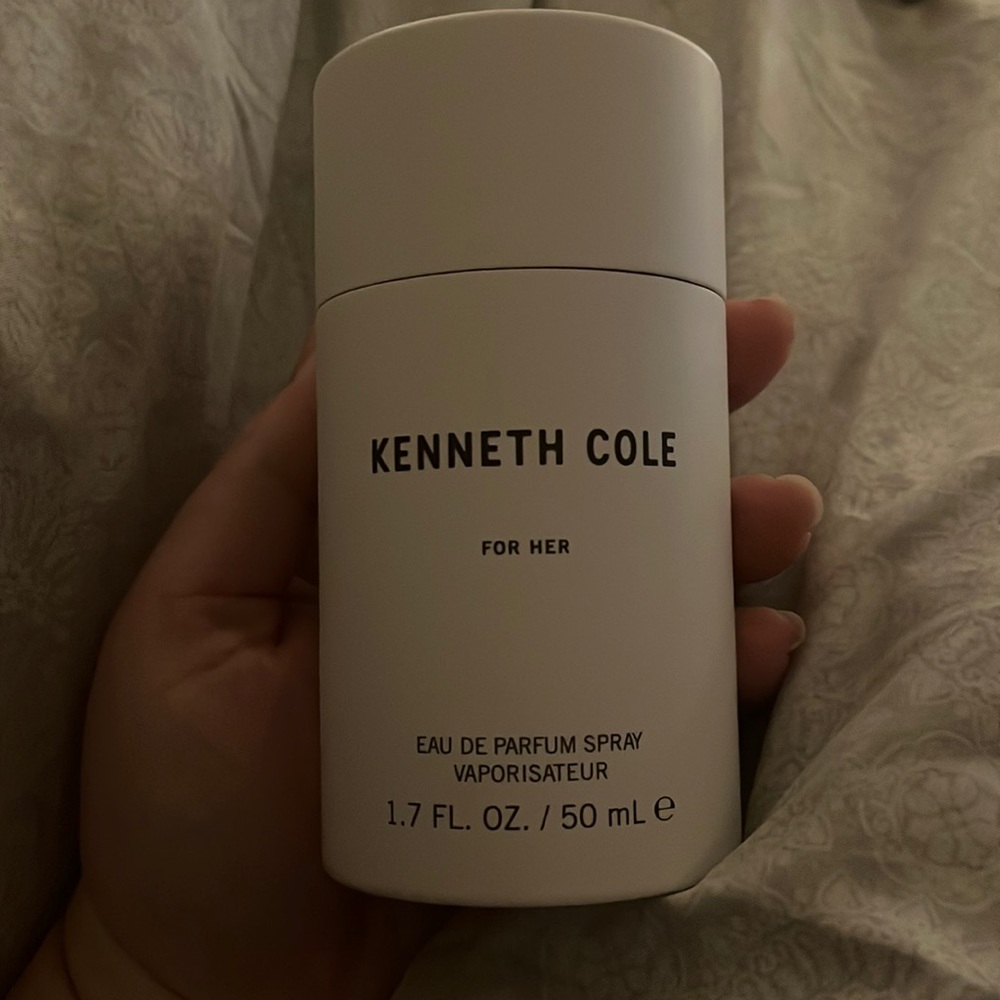 Kenneth Cole for her perfume, Plastic is off but it’s brand new.